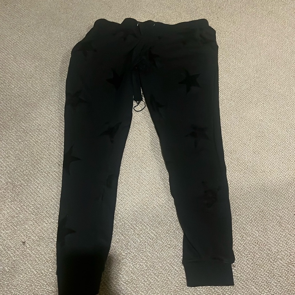 Woman’s black sweats with stars